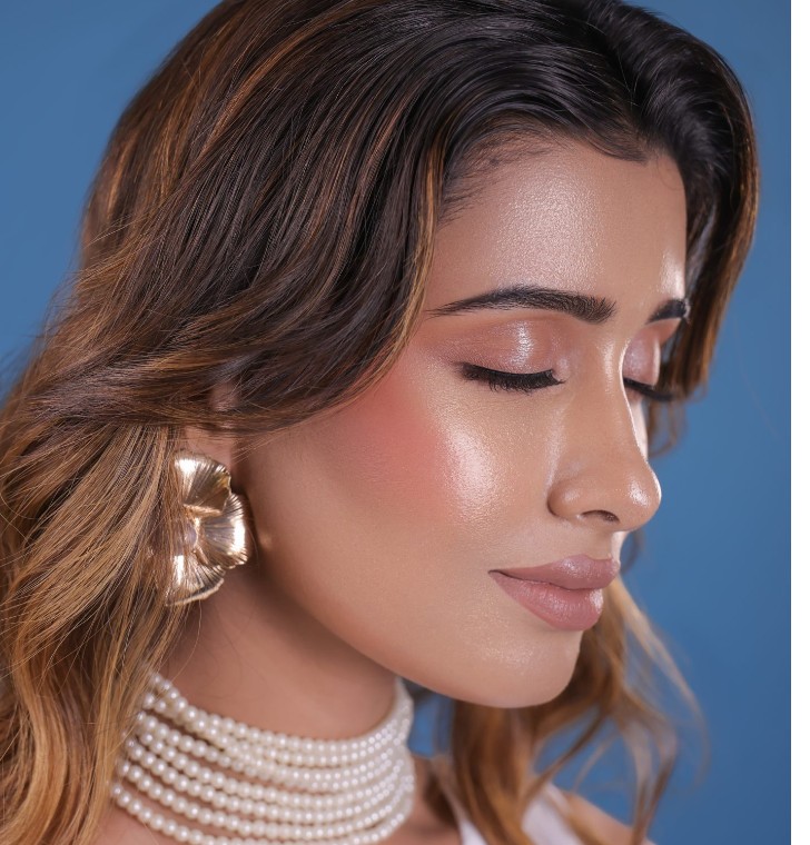 Model with soft glam makeup wearing 53S Beauty lashes