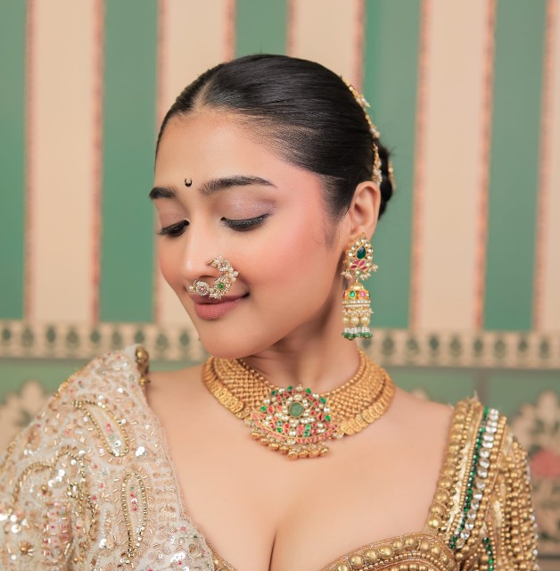 Bride in gold jewellery wearing 53S Beauty lashes